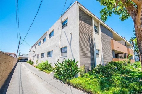 a large building with a street in front of it