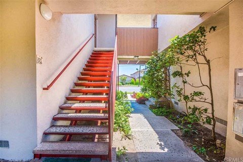 a set of stairs leading up to a house