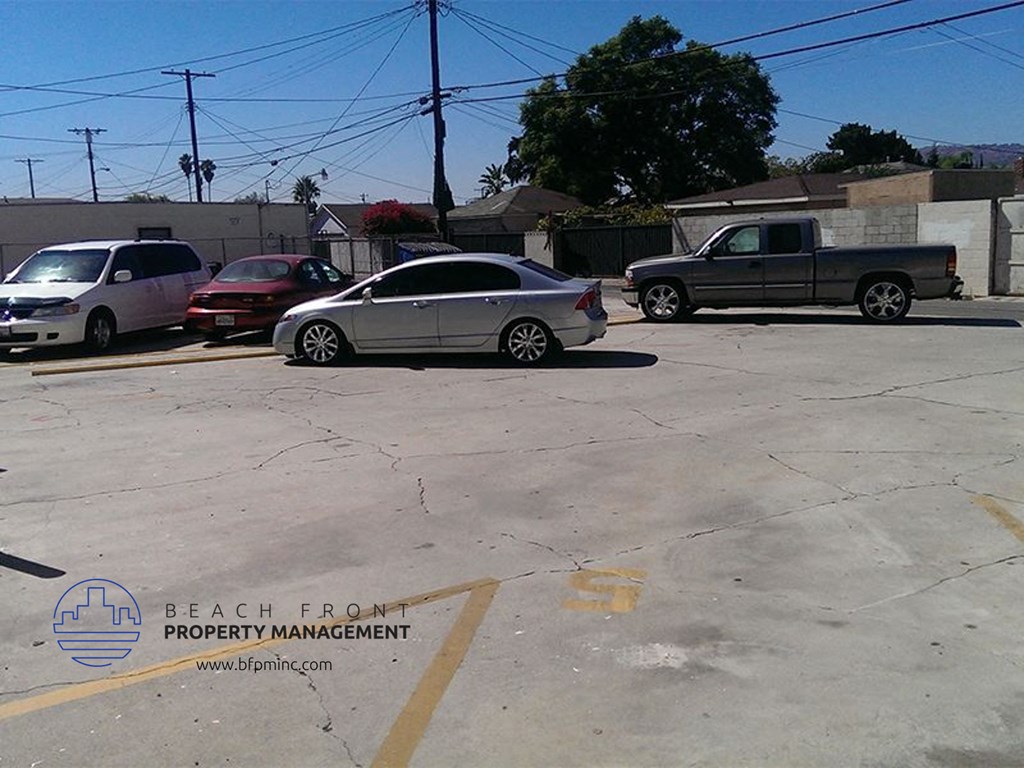a group of cars parked in a parking lot