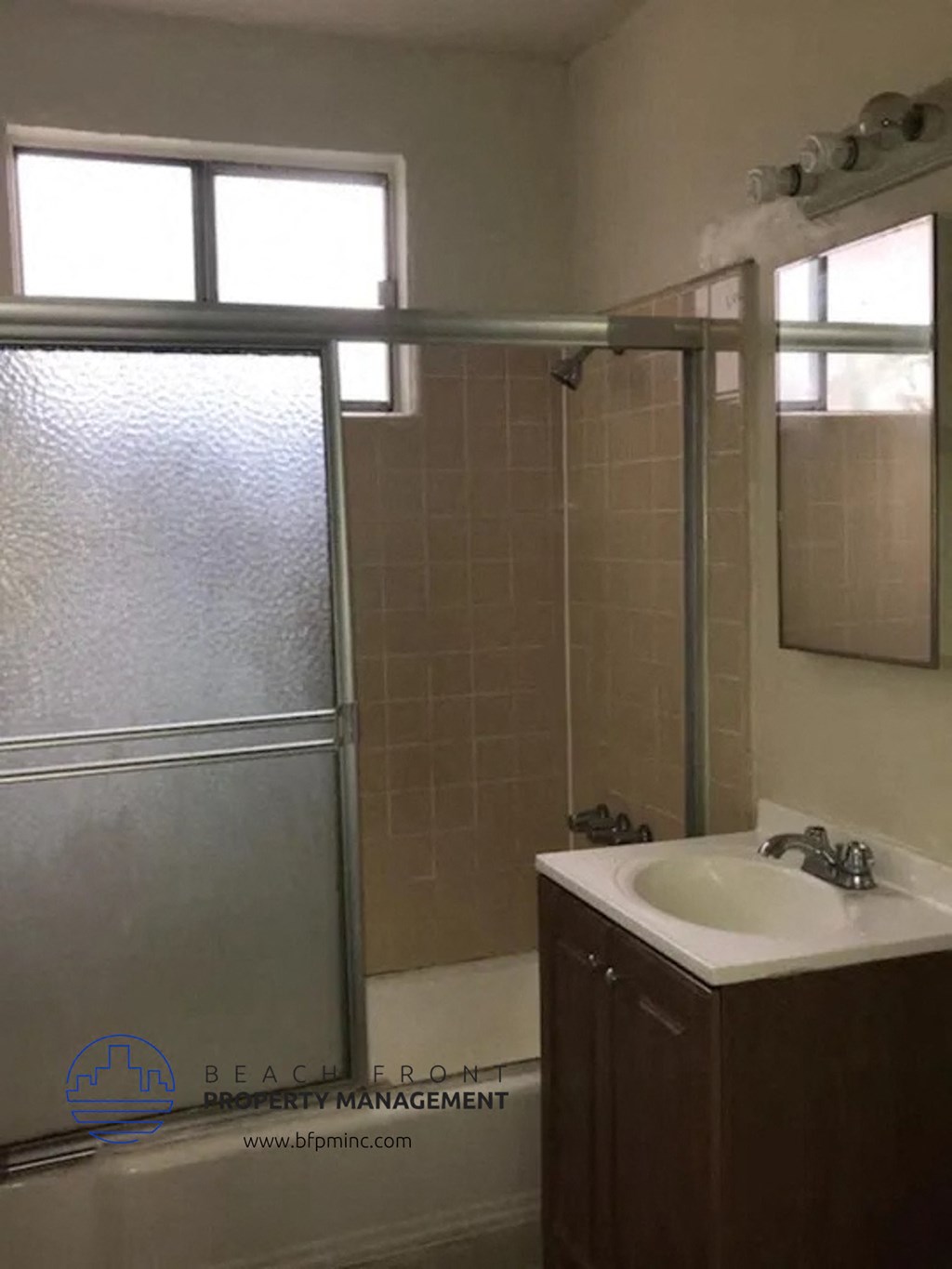 a bathroom with a sink and a shower