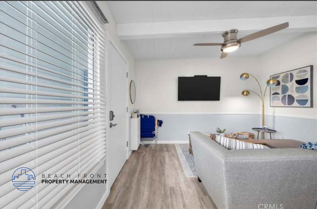 a living room with a couch and a tv