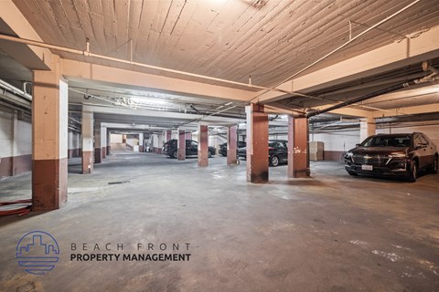 a parking garage with cars parked in it
