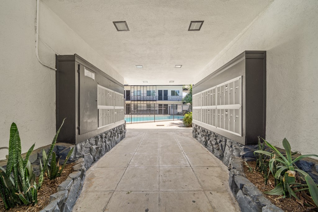 the walkway to the pool at the preserve apartments