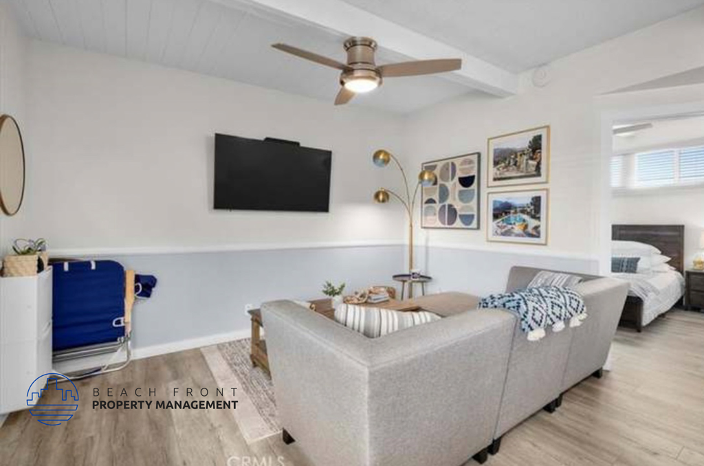 a living room with a couch and a tv