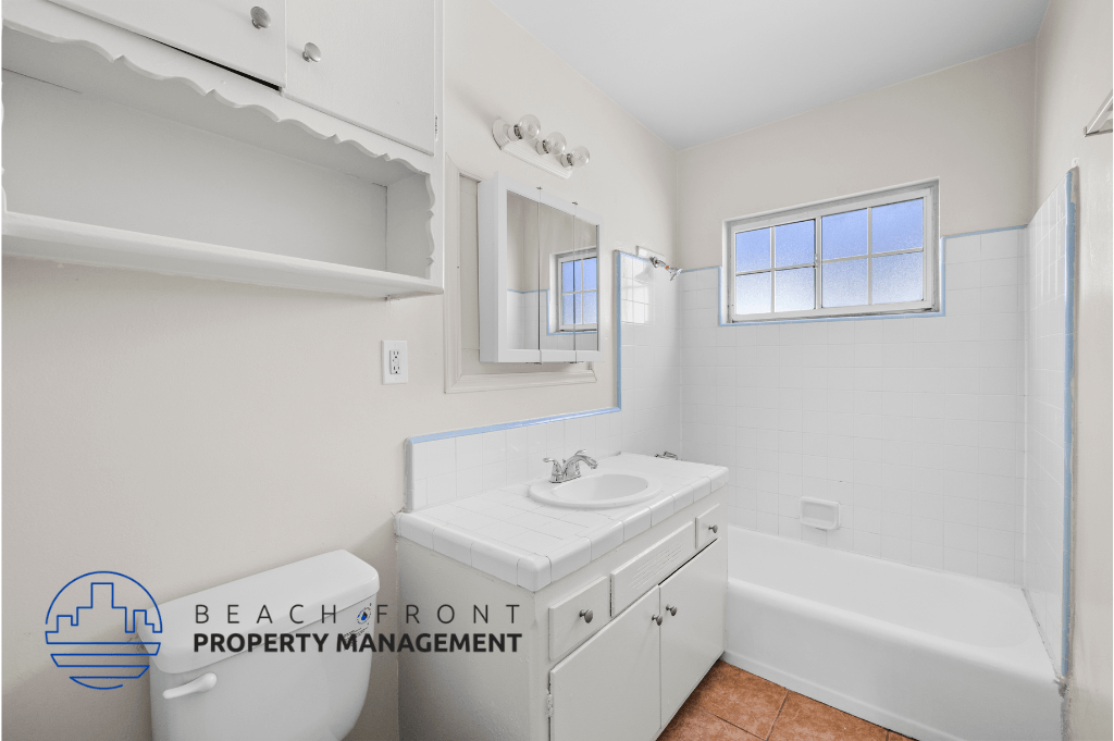 a bathroom with a sink and a bath tub and a mirror