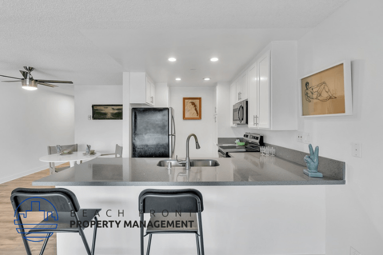 a kitchen with a counter top and a sink