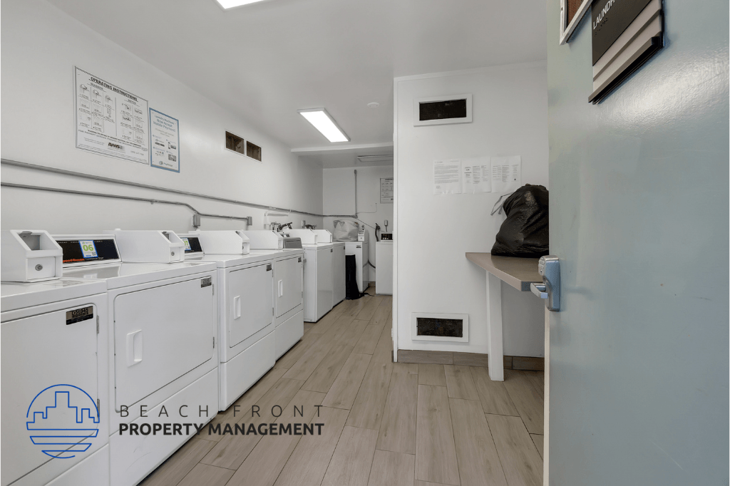 an image of a laundry room with washers and dryers