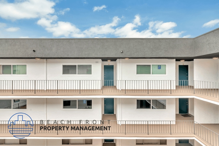 a view of the front of a building with the property management logo