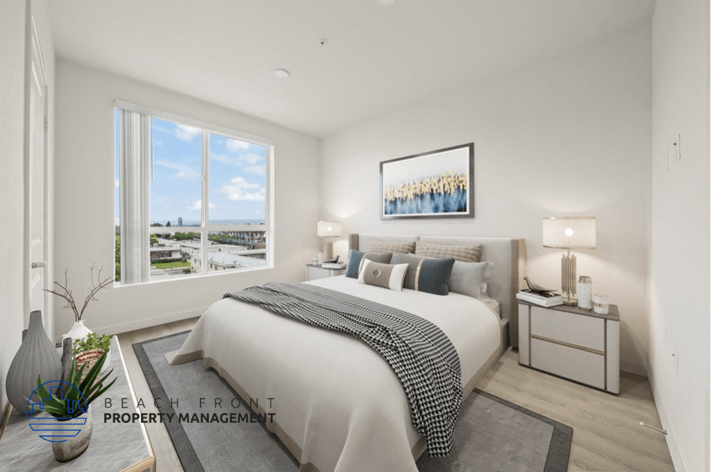 a bedroom with a bed and a large window