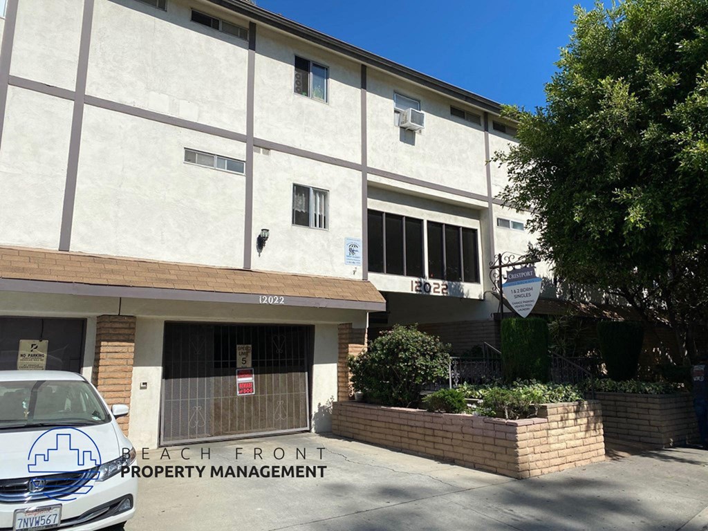 the front of the beach front property management building