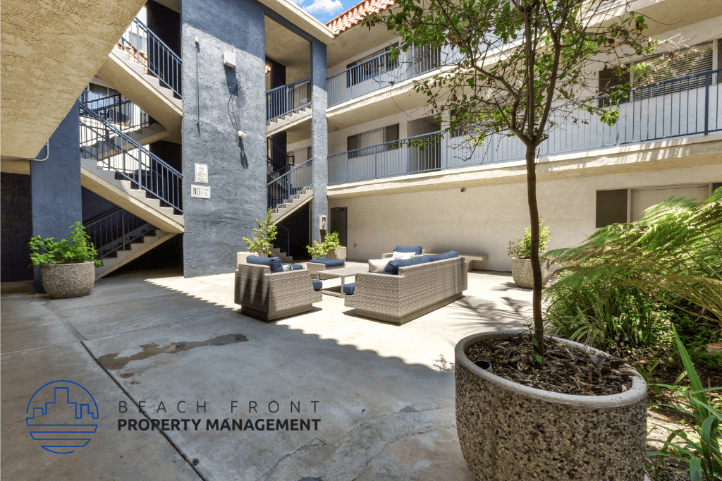 the courtyard of the beach front property management building