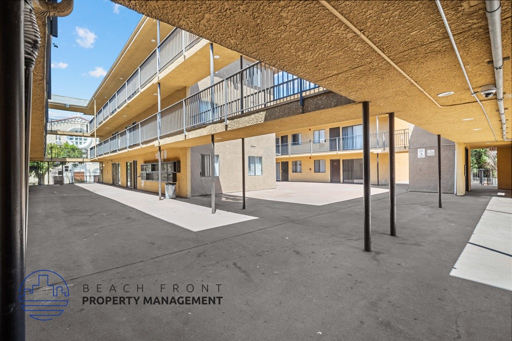 a view of the building from the outside of the beach front property management