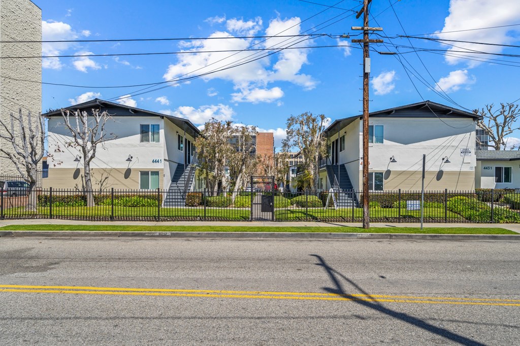 a row of houses on the side of a street