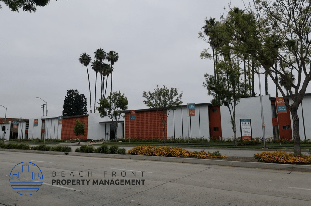 a view of the beach front property management building from the street