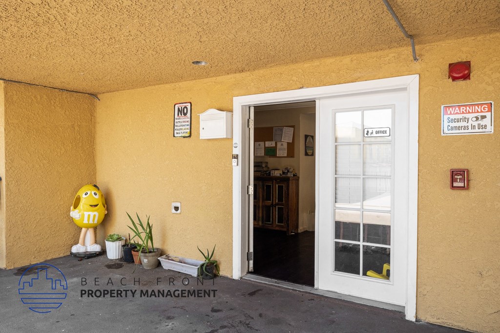 the entrance to the building from the parking lot