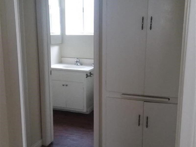 a bathroom with a sink and a window