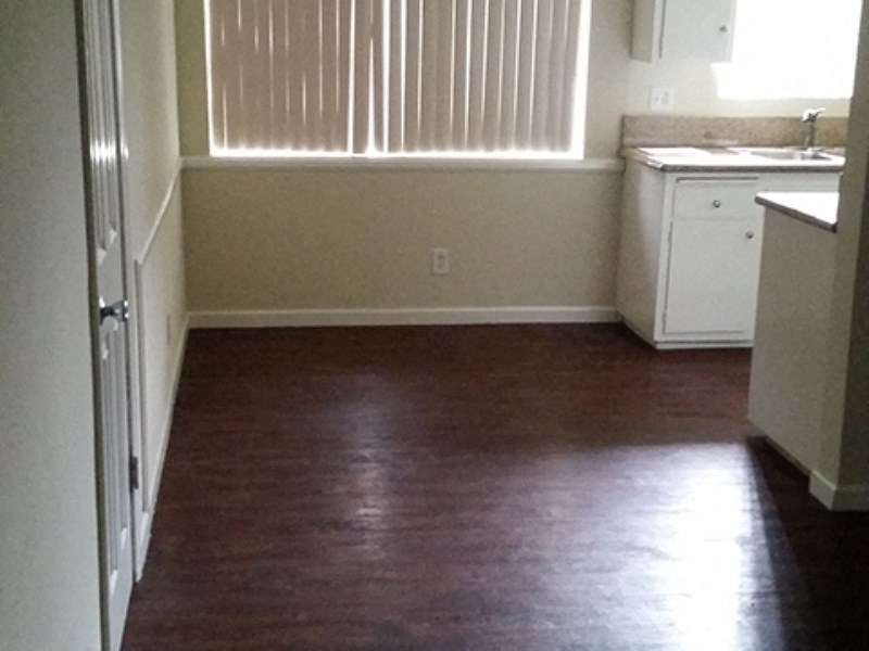 a kitchen with a sink and a window