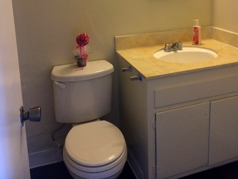 a bathroom with a toilet sink and bathtub