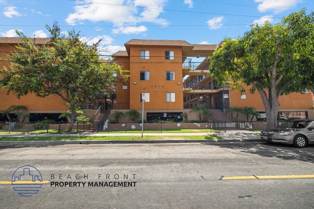 a view of the beach front property management building from the street