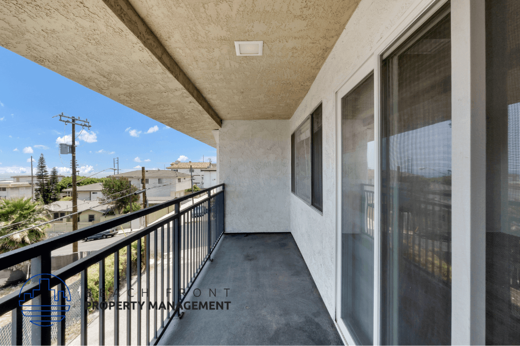 a balcony with a view of the city