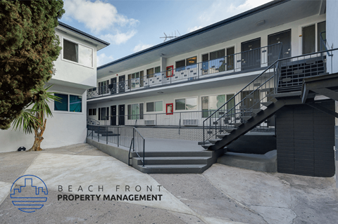a view of the front of a beach front property management building