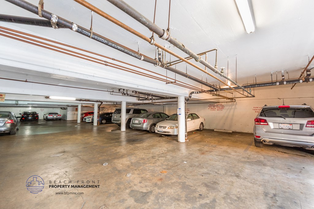 a parking garage with cars parked in it