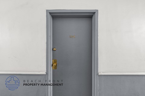the front door of the beach front property management office