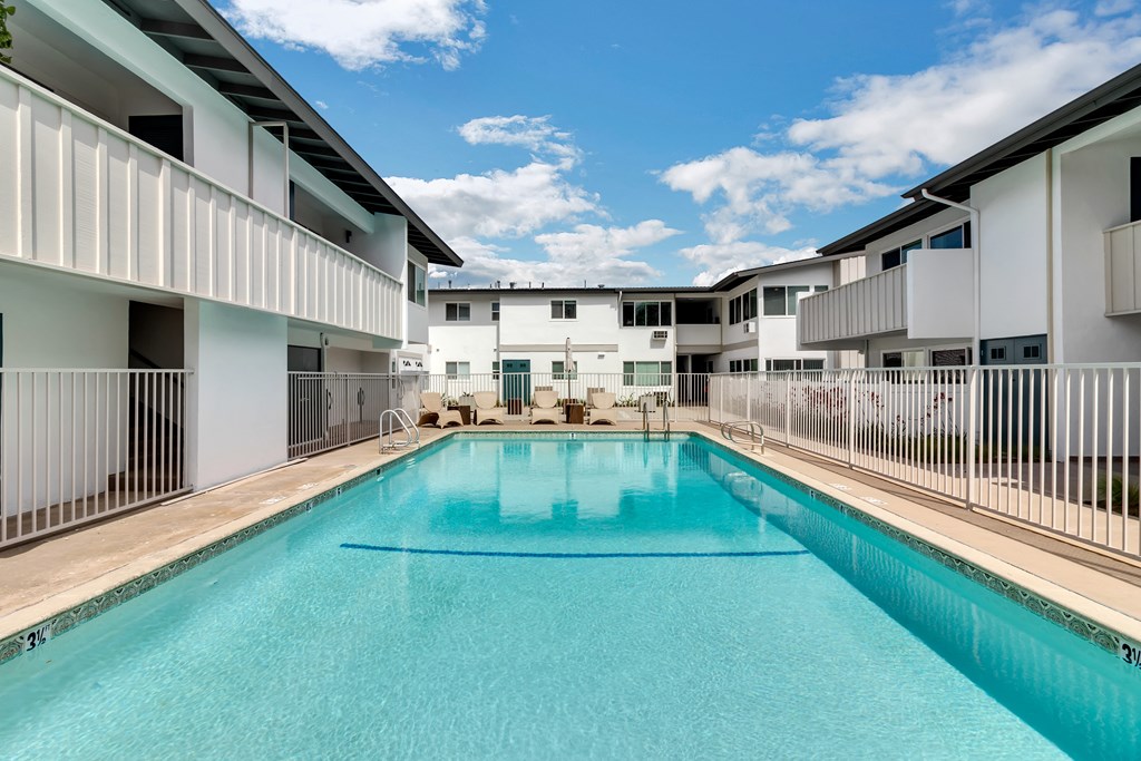 A large swimming pool in a residential area.