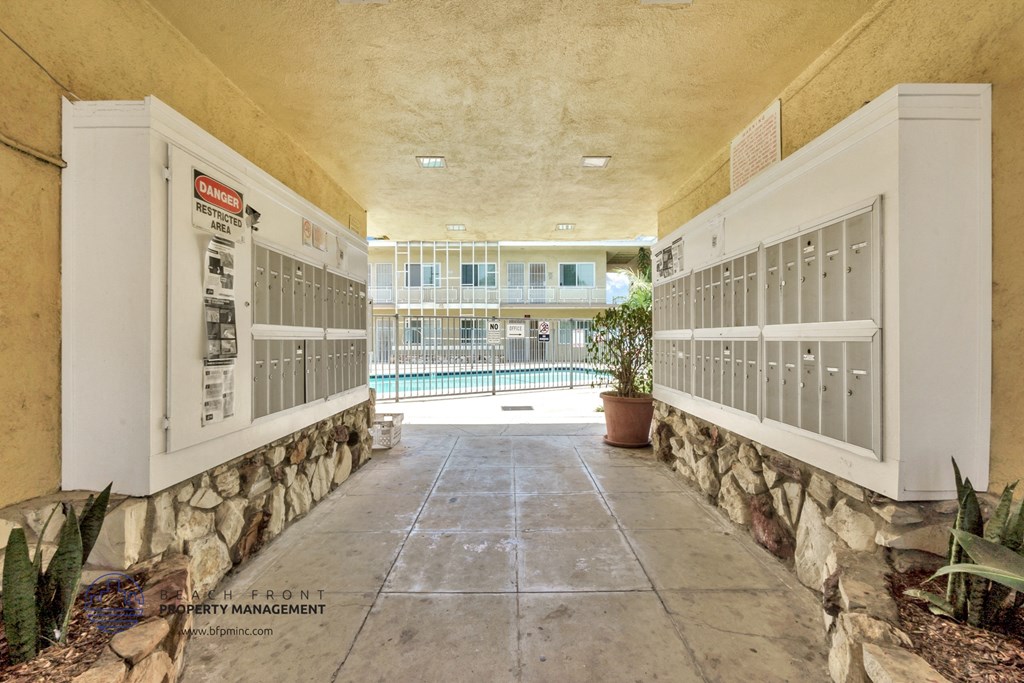 a building with a pool in the background