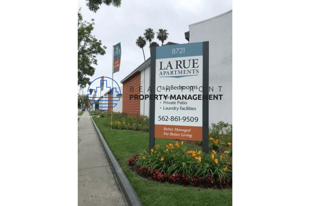 the sign for the large apartments is shown in front of the building
