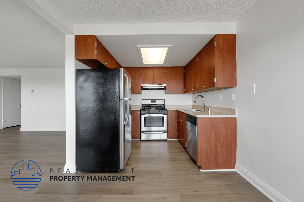 a kitchen with wooden cabinets and stainless steel appliances and a refrigerator