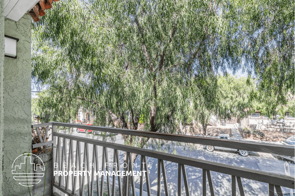 a view of a tree from a balcony