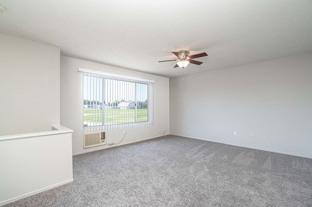bedroom with ceiling fan and plenty of natural light