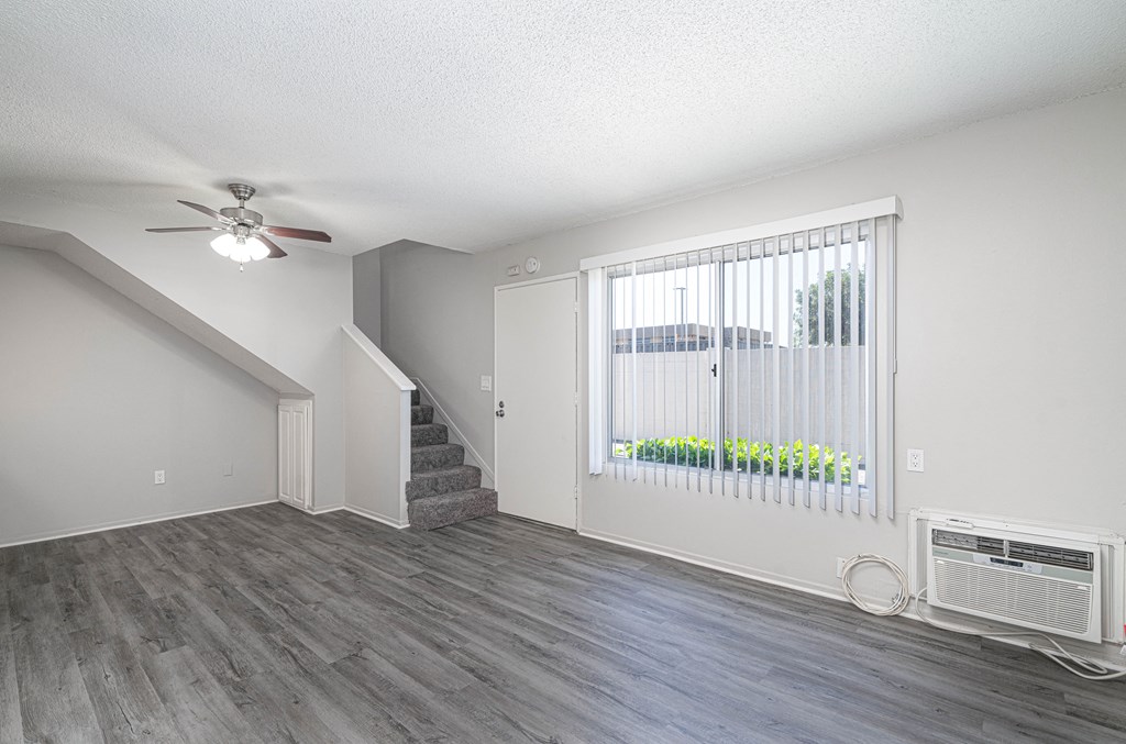 large living room with plank floors