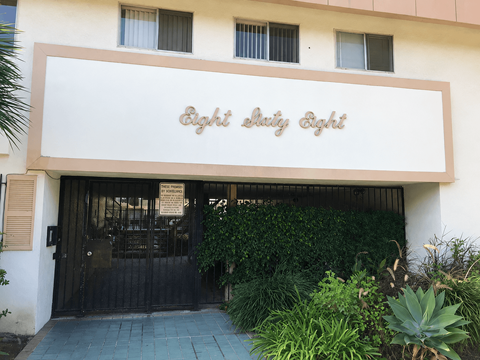 The front of a building with a sign that says "Eight Day Eight".