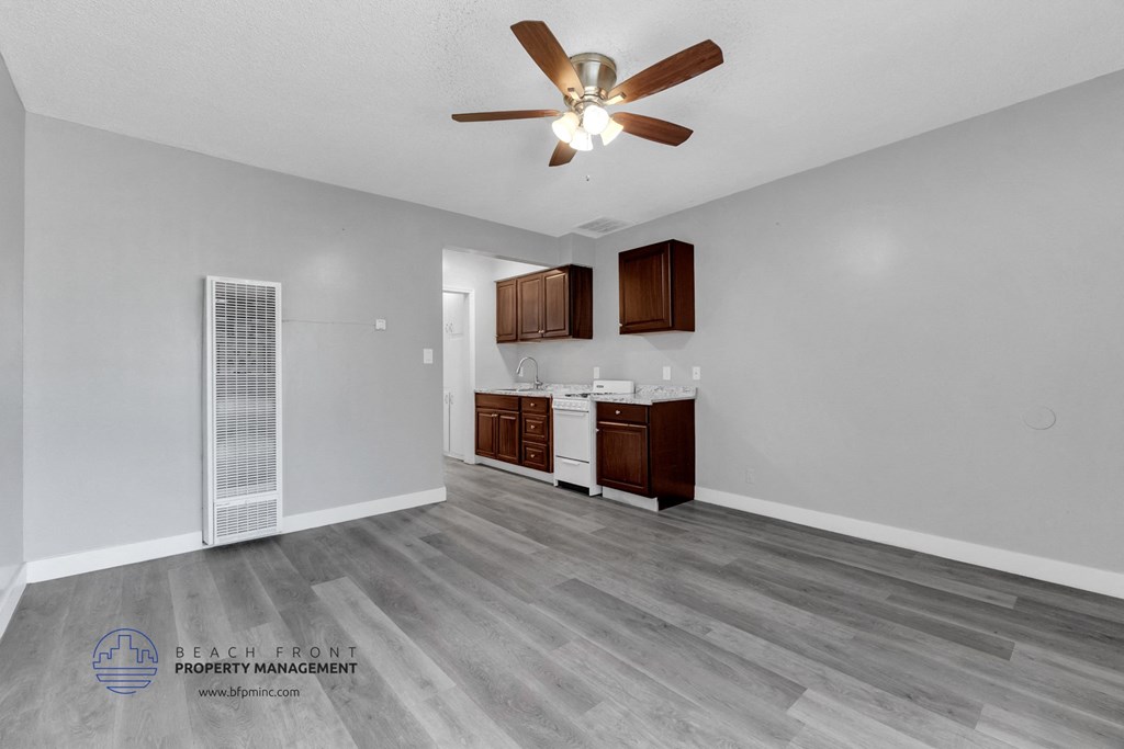 a kitchen and living room in a 555 waverly unit