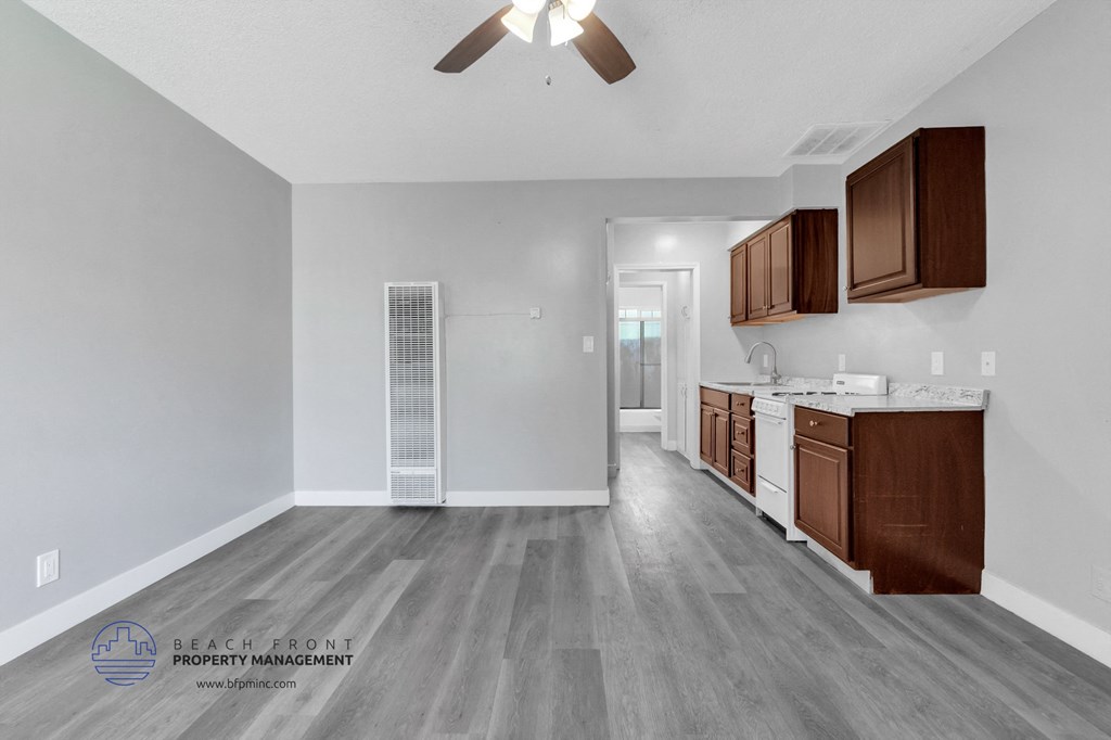 a kitchen and living room in a 555 waverly unit