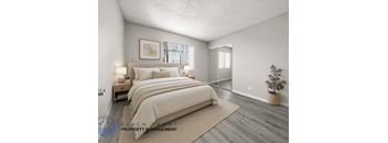 A bedroom with a large bed, a nightstand, a plant, and a framed picture on the wall.