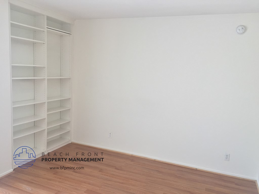 the walk in closet in the 2nd bedroom