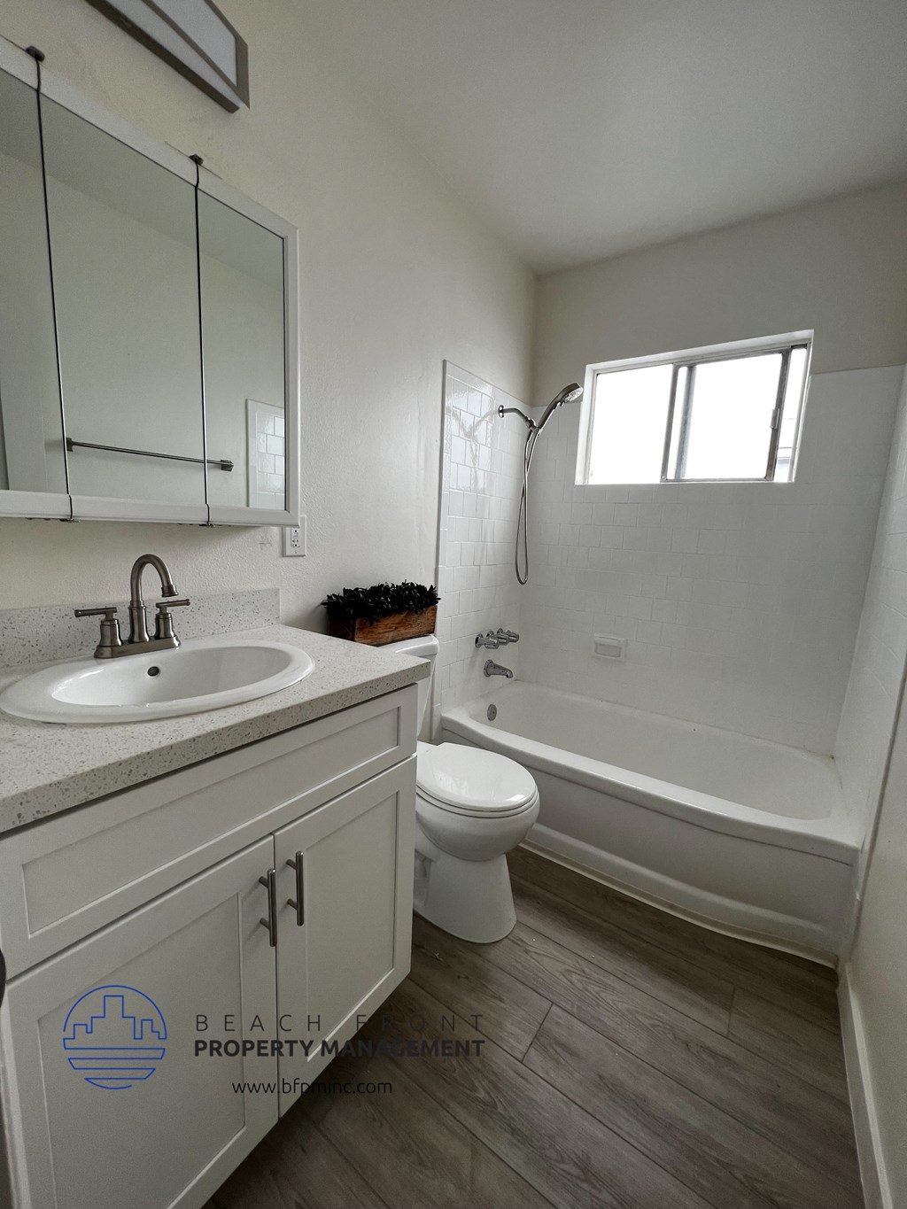 a bathroom with a sink toilet and bathtub