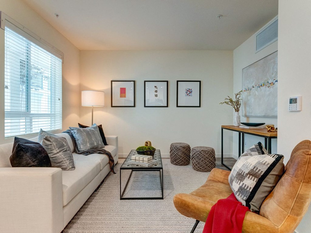a living room with a couch and a coffee table