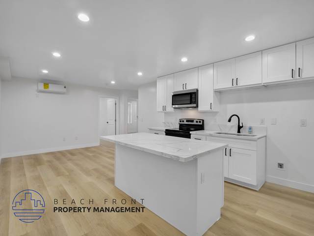 1-bedroom apartment at Paradise Gardens Apartments in Long Beach, CA