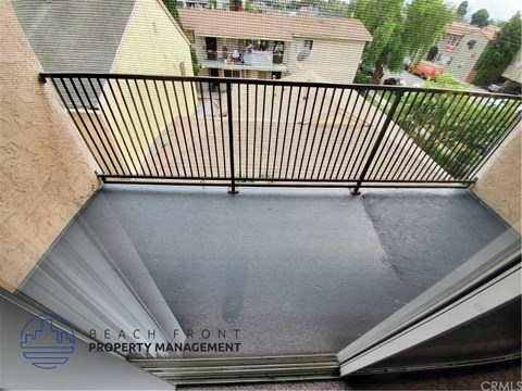 a view of the bottom of a balcony with a gate on it