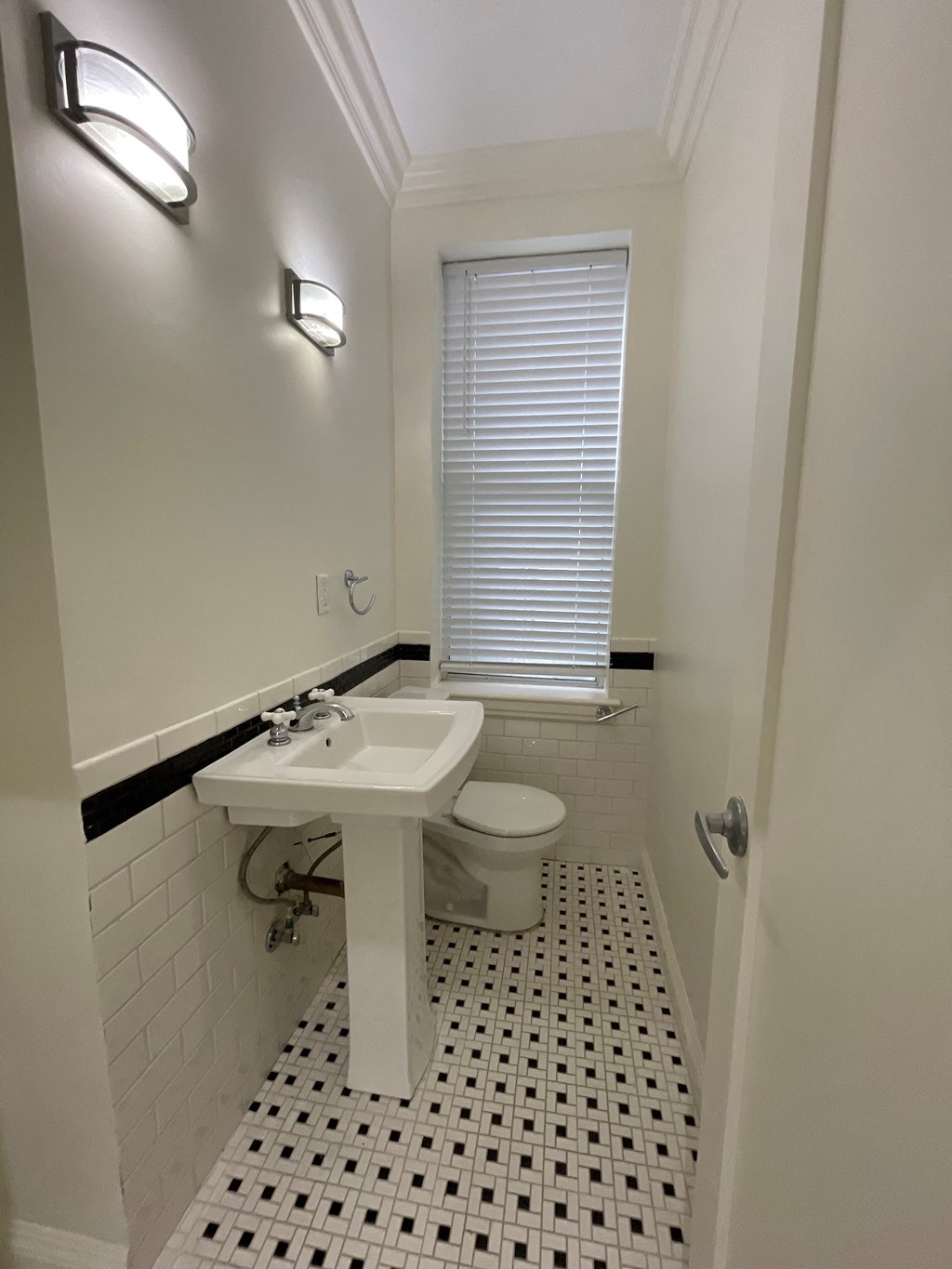 a small bathroom with a toilet and a sink