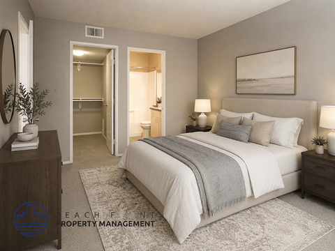 A bedroom with a large bed, a dresser, and a mirror.