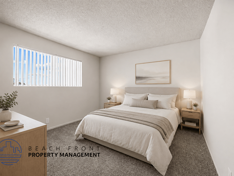 A bedroom with a bed, nightstands, and a window with blinds.