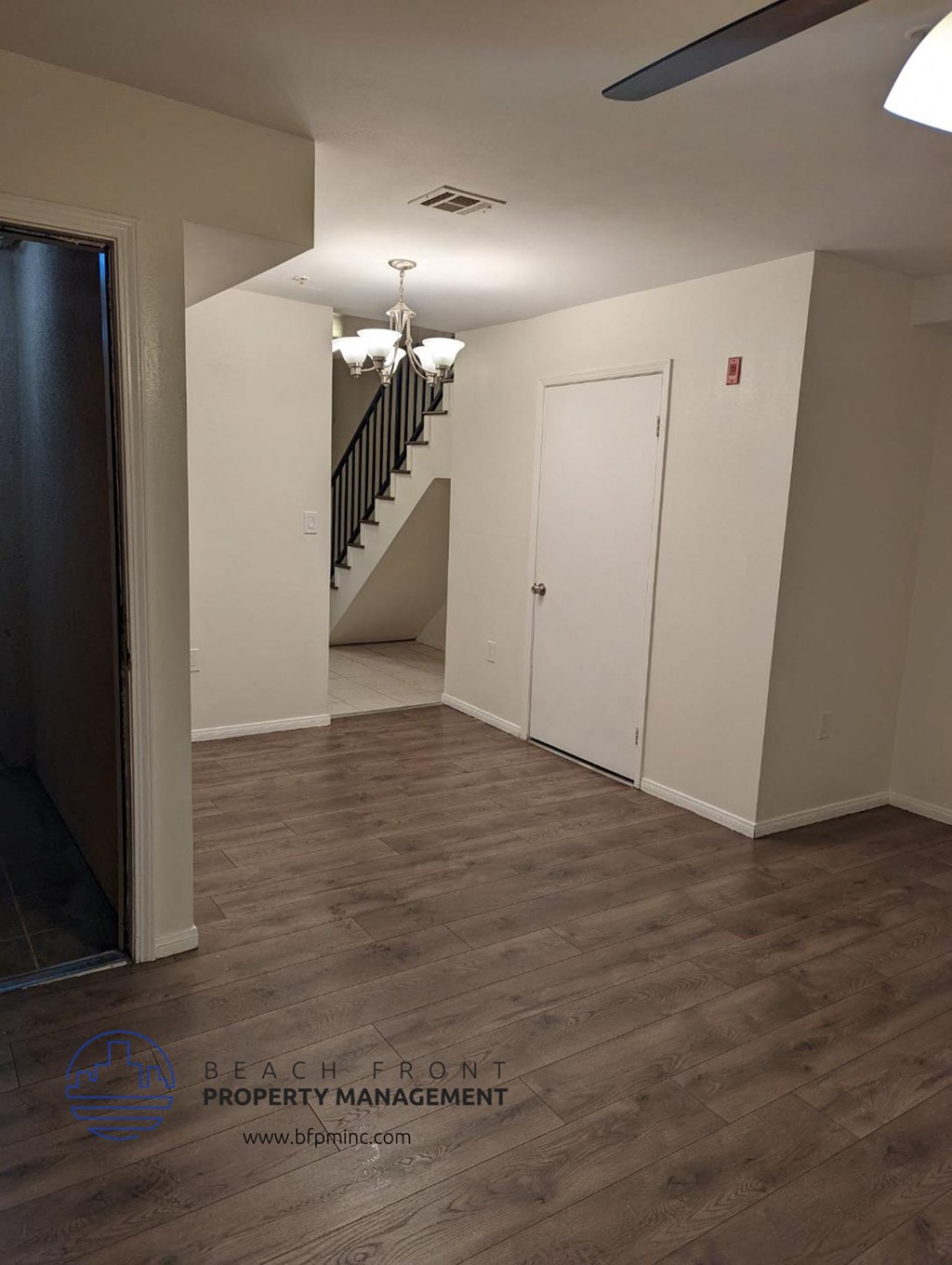 a view of the living room from the entrance of a house