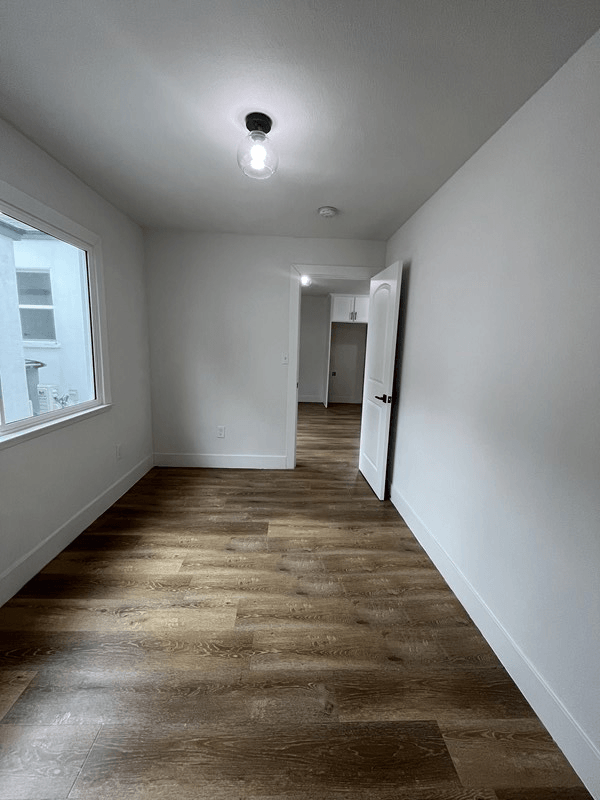 a bedroom in a 555 waverly unit