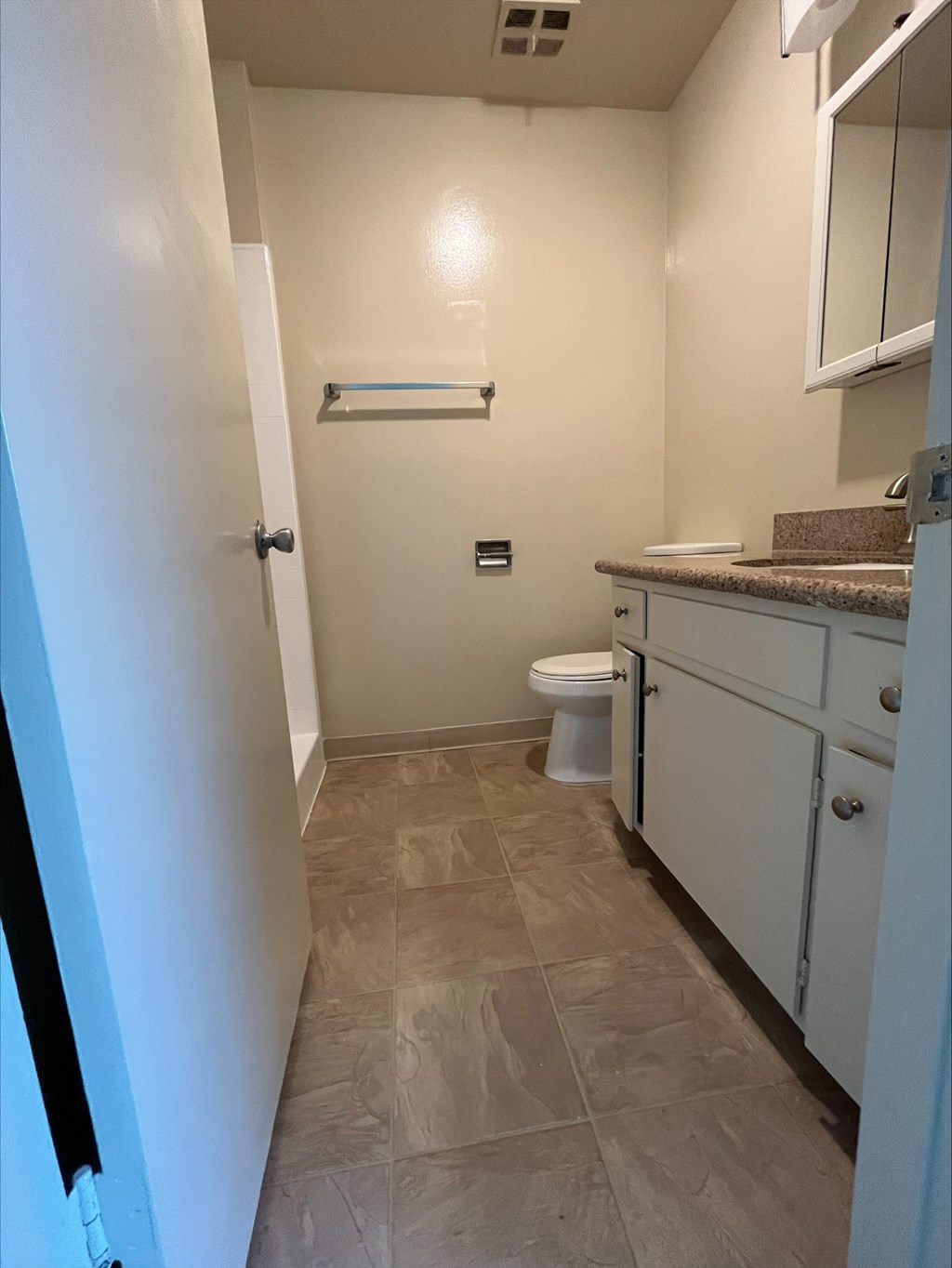 a small bathroom with a toilet and a sink