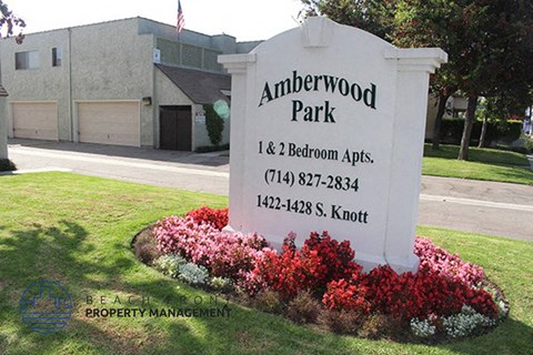 the amerenwood park sign in front of a building